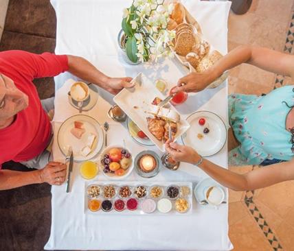 Two guests having breakfast